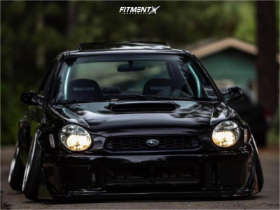 2002 Subaru Impreza WRX with 18x10.5 Work Vs Xx and Atlas 215x35