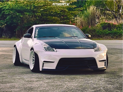 リオンザード 2006 Nissan 350Z Grand Touring with 18x11 Cosmis Racing Xt