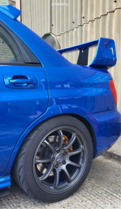 2007 Subaru Impreza WRX STI with 18x9 Enkei Pf09 and Nankang
