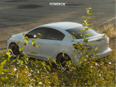 2011 Mazda 3 i with 18x9 Konig Ssm and Nitto 215x35 on Lowering Springs