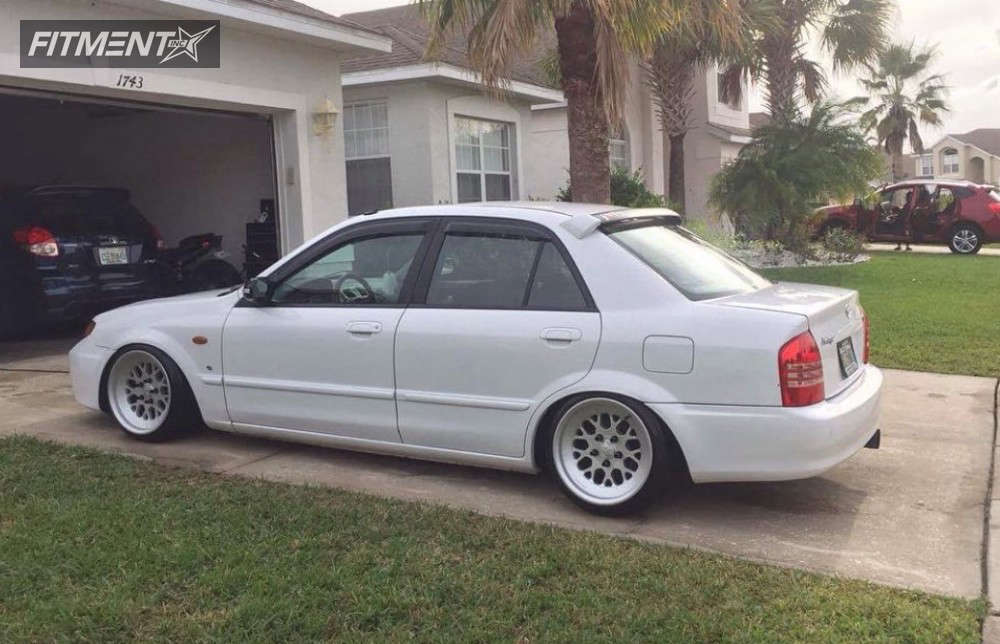 2003 Mazda Protege LX with 16x9 Fifteen52 Formula Tr and Federal