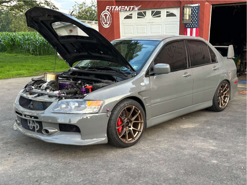 2006 Mitsubishi Lancer Evolution with 18x9.5 Enkei Tsv and