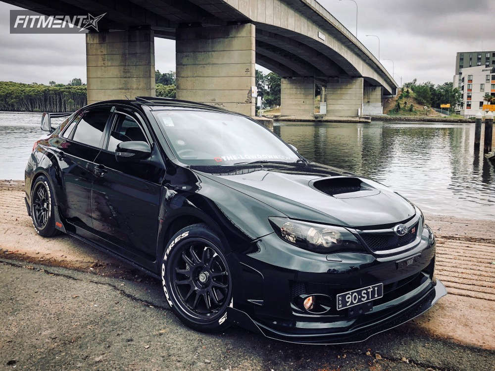 2012 Subaru WRX STI Base with 18x9 Cosmis Racing XT-206R and