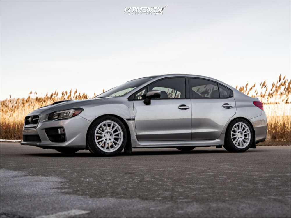 2016 Subaru WRX Base with 17x8 Anovia Kenzo and Lexani 235x45 on