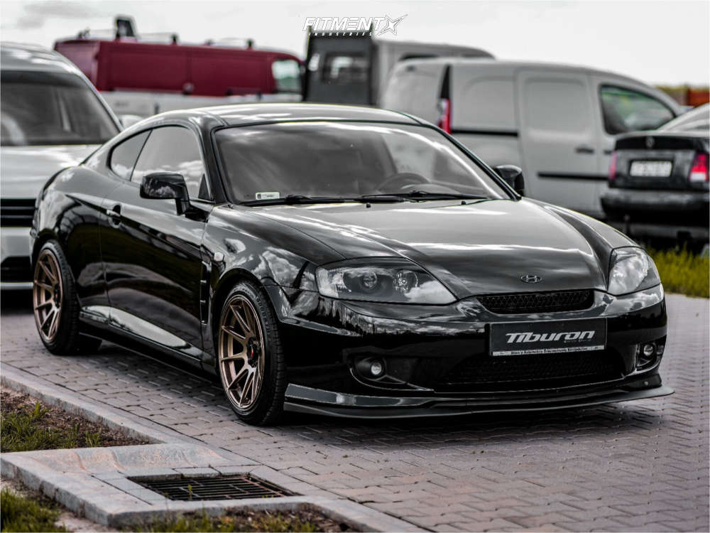 2006 Hyundai Tiburon GS with 17x9 Japan Racing Jr11 and Goodride