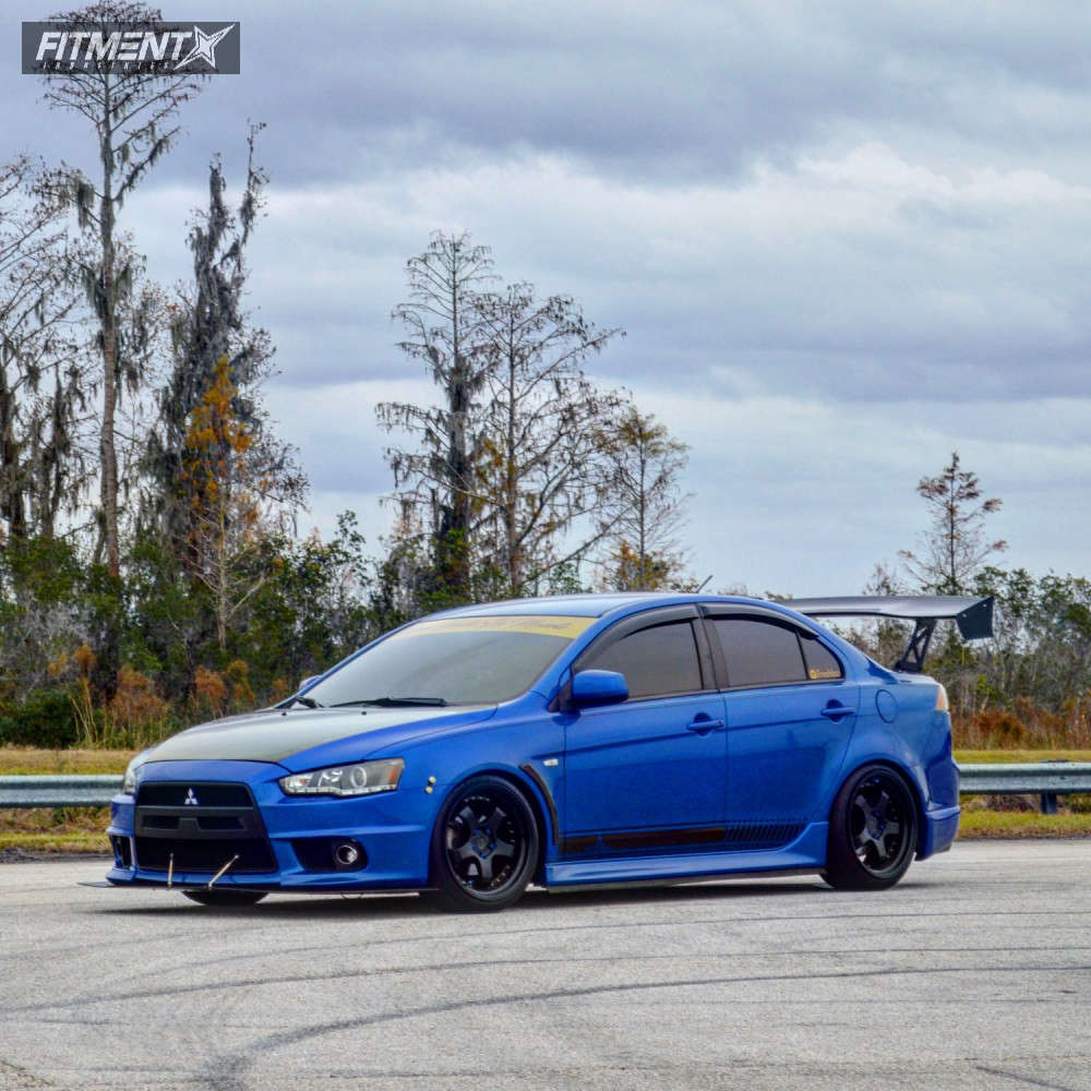 2012 Mitsubishi Lancer SE Sportback with 18x9.5 Aodhan Ah01 and
