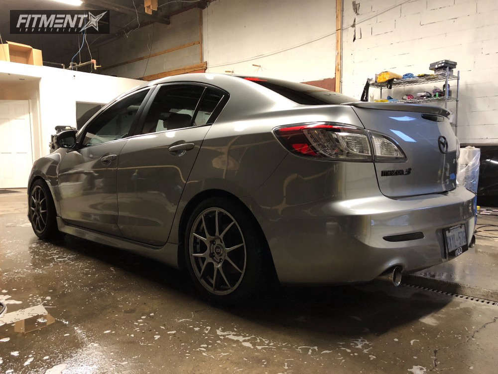 2010 Mazda 3 with 17x7.5 Enkei Ys5 and Bridgestone 215x45 on Lowering