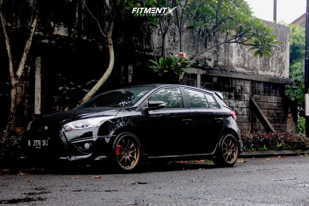 2015 Toyota Yaris CE with 17x7.5 Volk Ce28n and Accelera 215x45 on