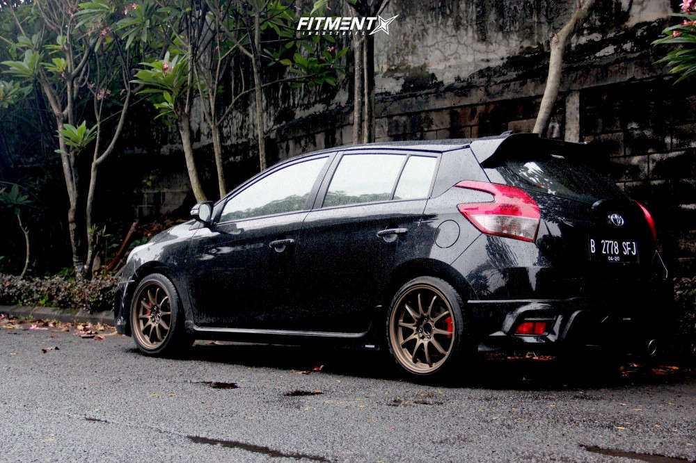 2015 Toyota Yaris CE with 17x7.5 Volk Ce28n and Accelera 215x45 on