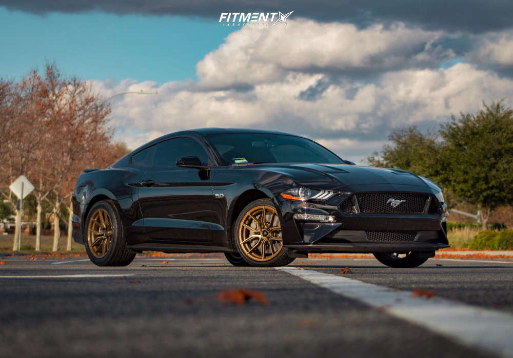 2018 Ford Mustang GT with 18x8.5 XXR 559 and Nitto 255x35 on Stock