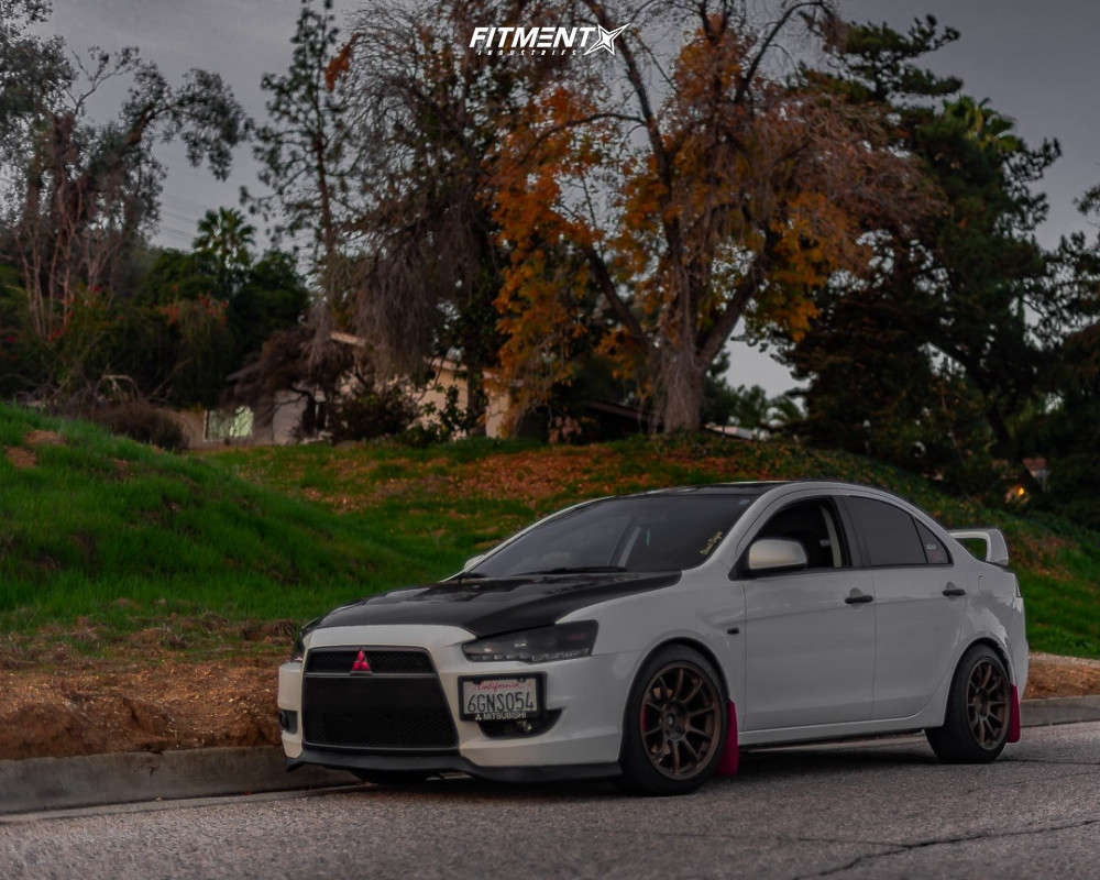 2009 Mitsubishi Lancer DE with 17x9 Aodhan Ah06 and Federal 225x45
