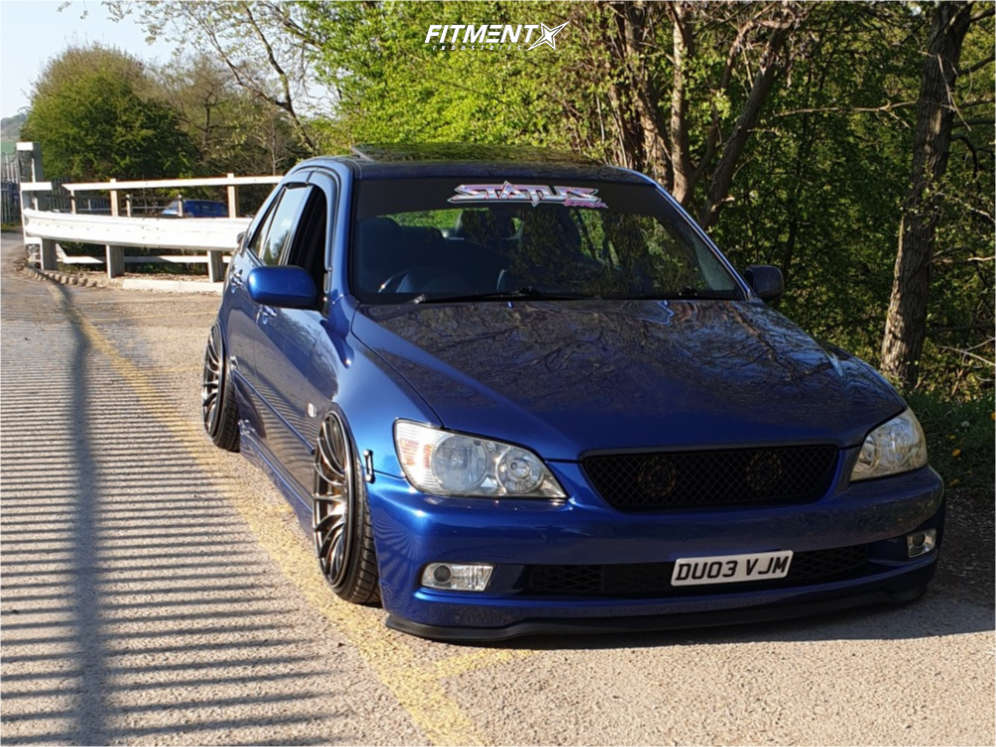2003 Lexus IS300 Base with 18x9.75 XXR 550 and Michelin 205x40 on