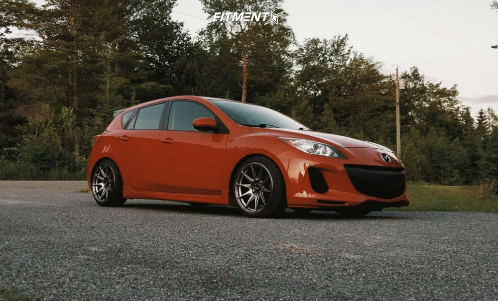 2012 Mazda 3 GX with 18x8.75 XXR 527 and Minerva 215x40 on