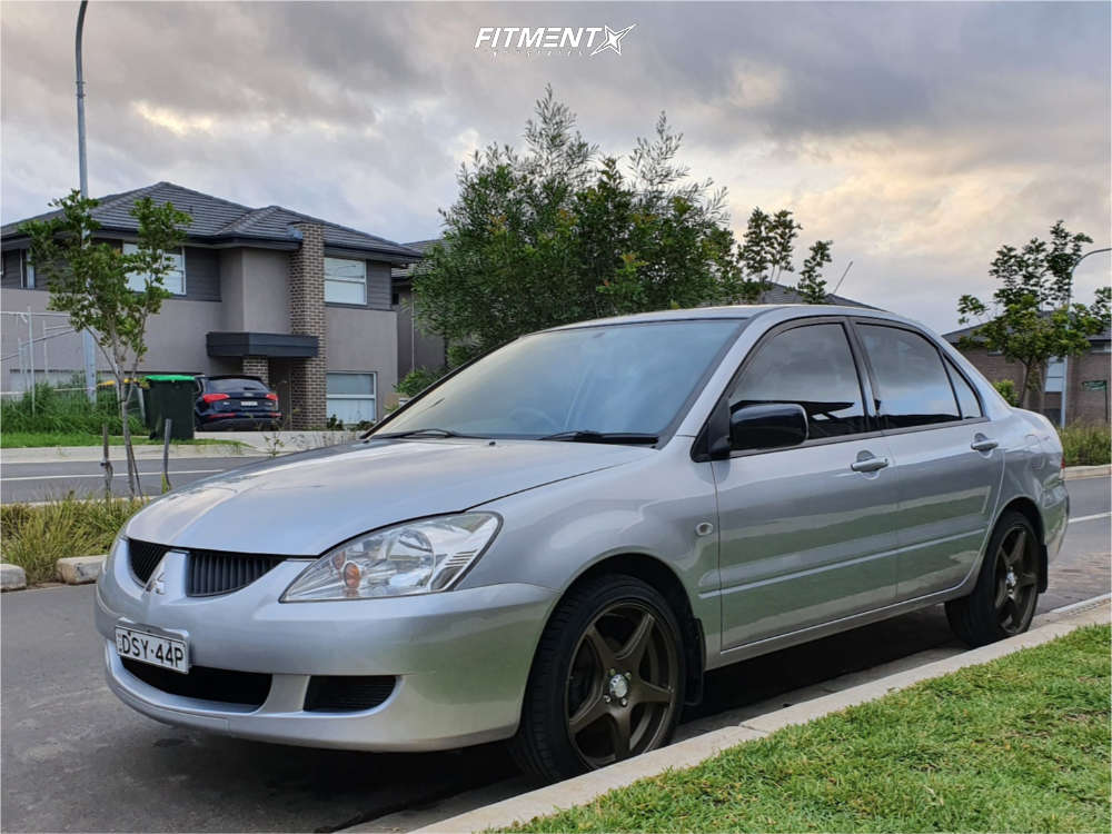 2004 Mitsubishi Lancer ES with 17x7 RPM R502 and Kumho 205x40 on Stock