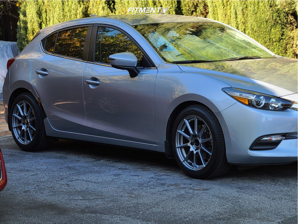 2018 Mazda 3 Touring with 17x8 Enkei Ts10 and Continental 215x50
