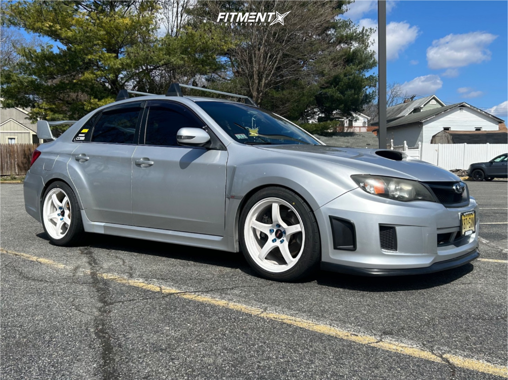 2011 Subaru Impreza WRX STI with 18x9.5 Gram Lights 57cr and
